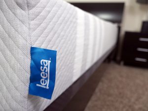 Ultra close up shot of the Leesa mattress logo