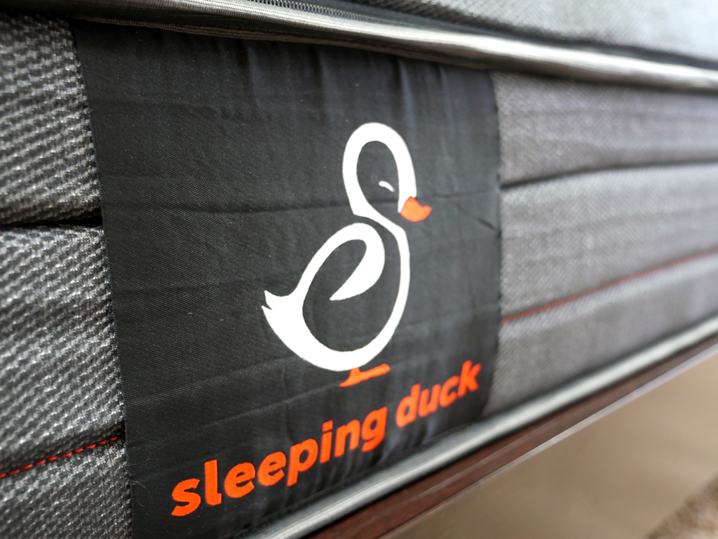 Close up of the side panel Sleeping Duck logo