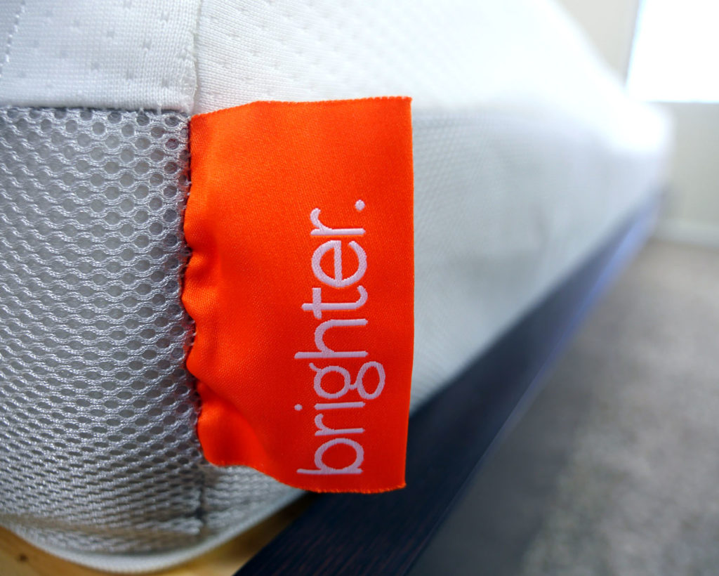 Ultra close up shot of the Brighter mattress logo